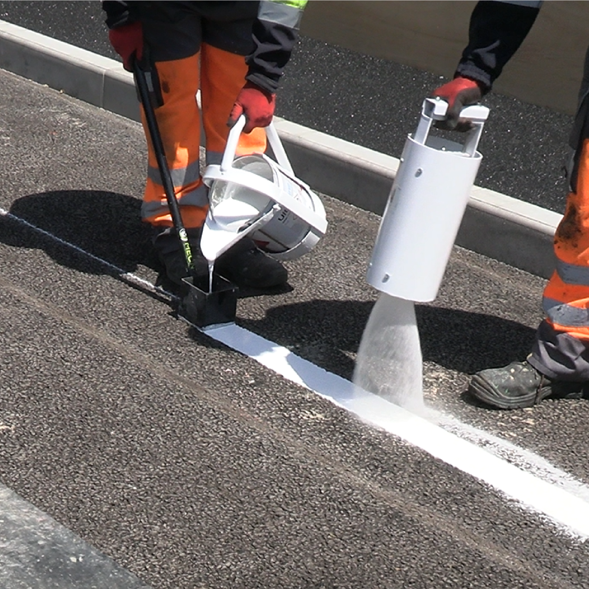Meon's UltraLine L210 being applied on a road