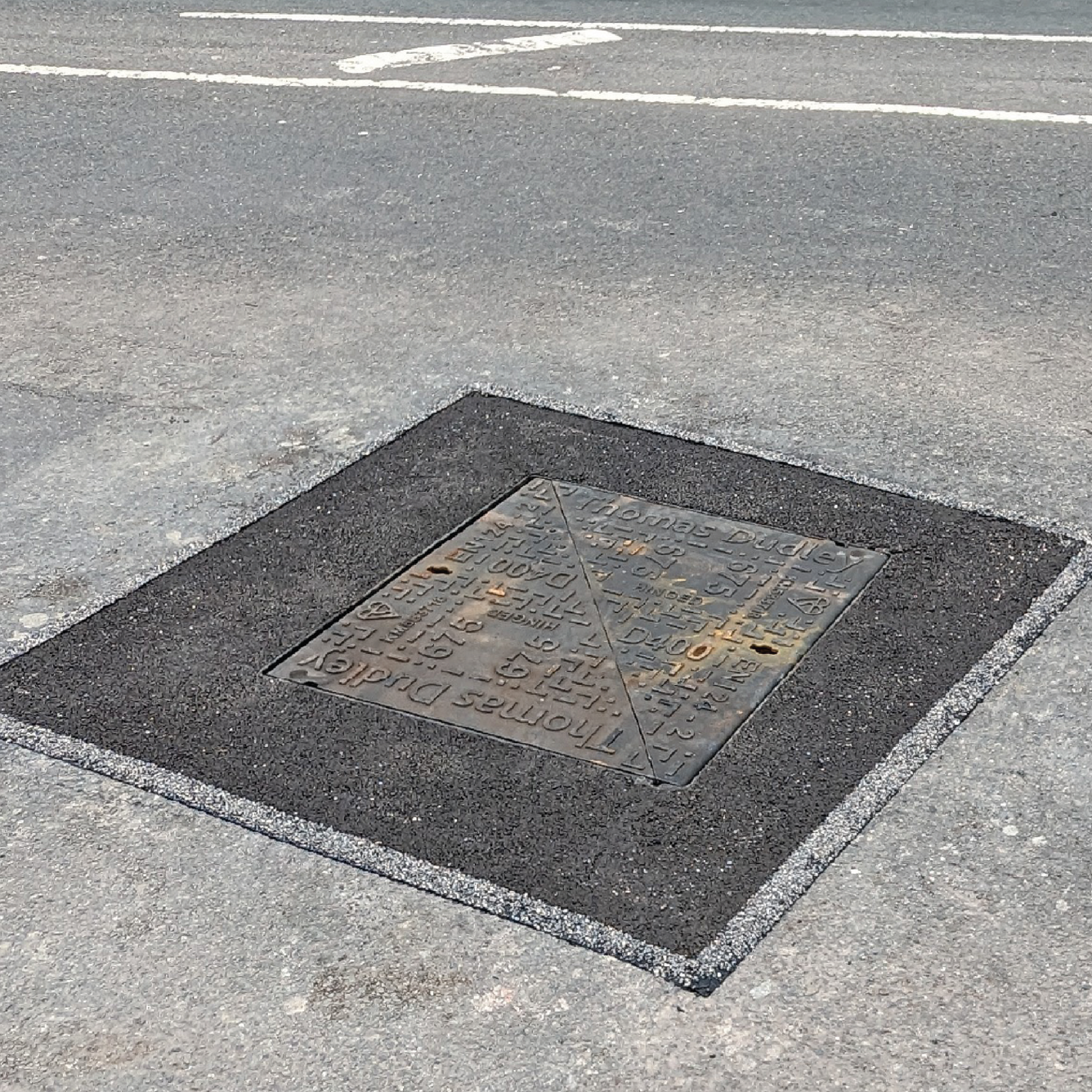 PermaFyx L273 6mm Permanent Asphalt Repair around a  manhole  cover